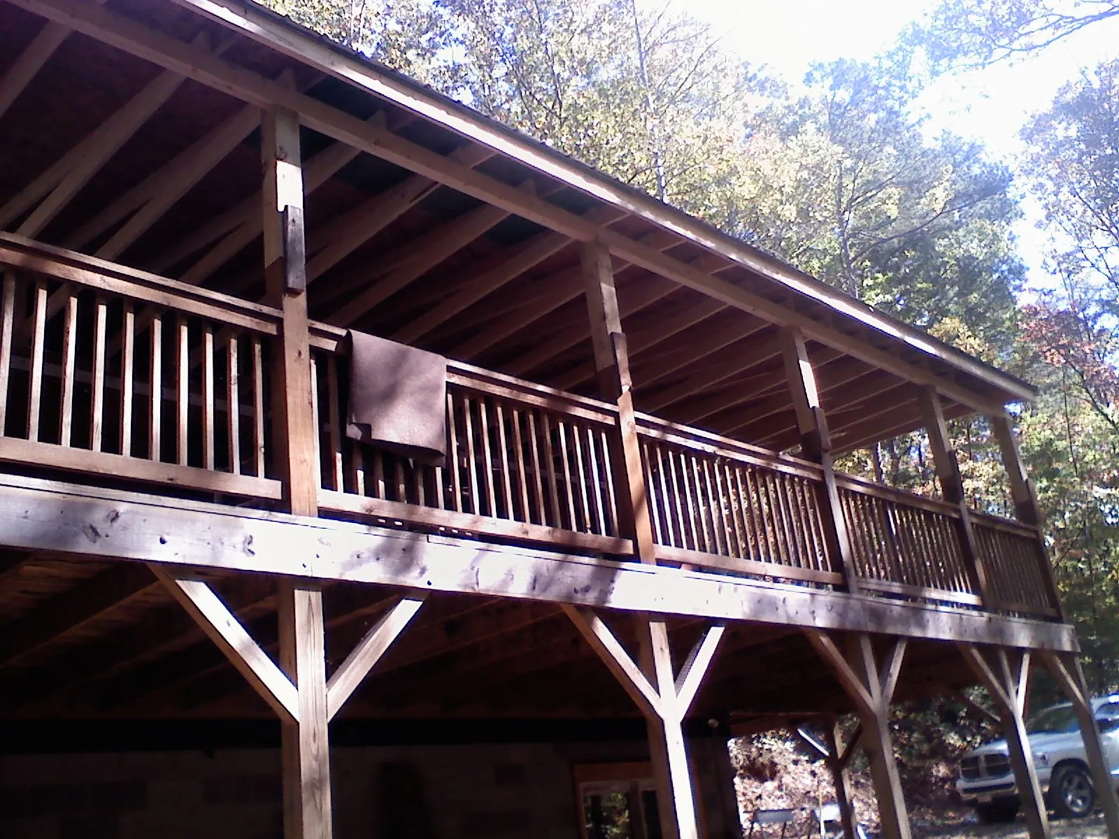 Timber framing under a new elevated porch and deck — Roof Leak Repair in Troy by Roofing Brothers